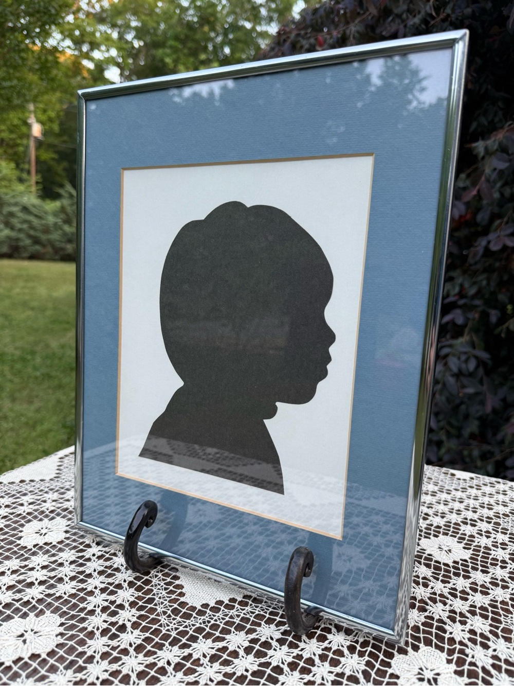 Vintage Child’s Silhouette Wall Art in Blue Mat with Chrome Frame